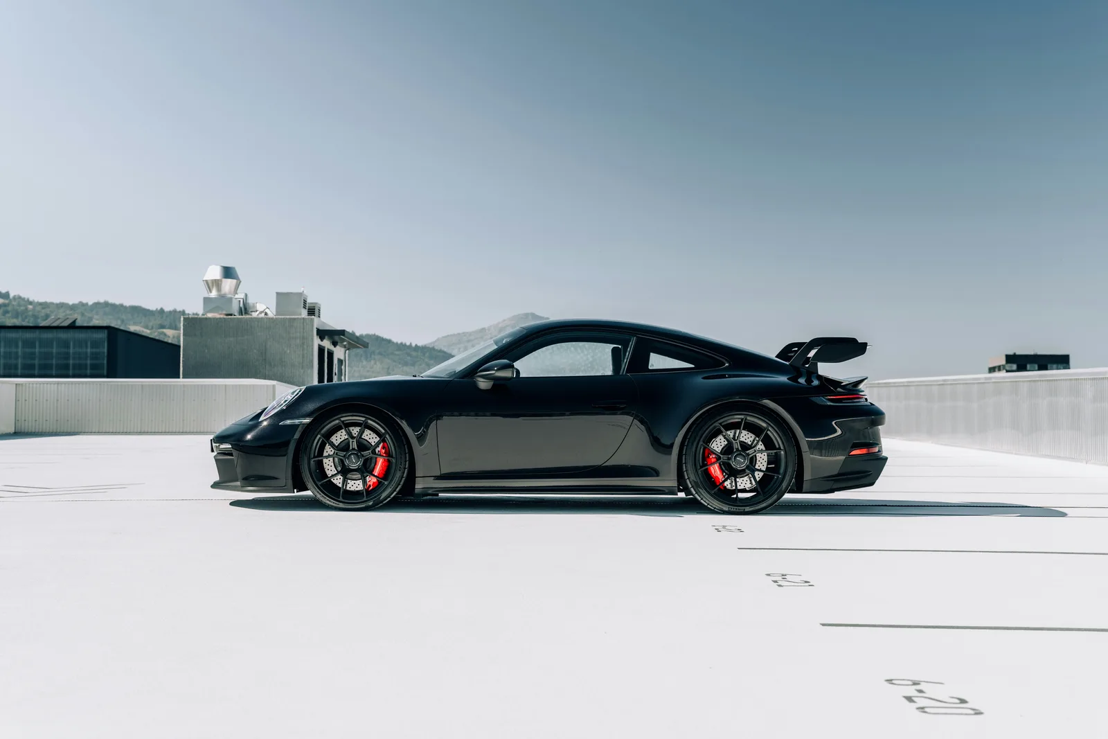 Porsche 911 GT3 parked on a rooftop, representing the 911 GT3 available to rent in Boston