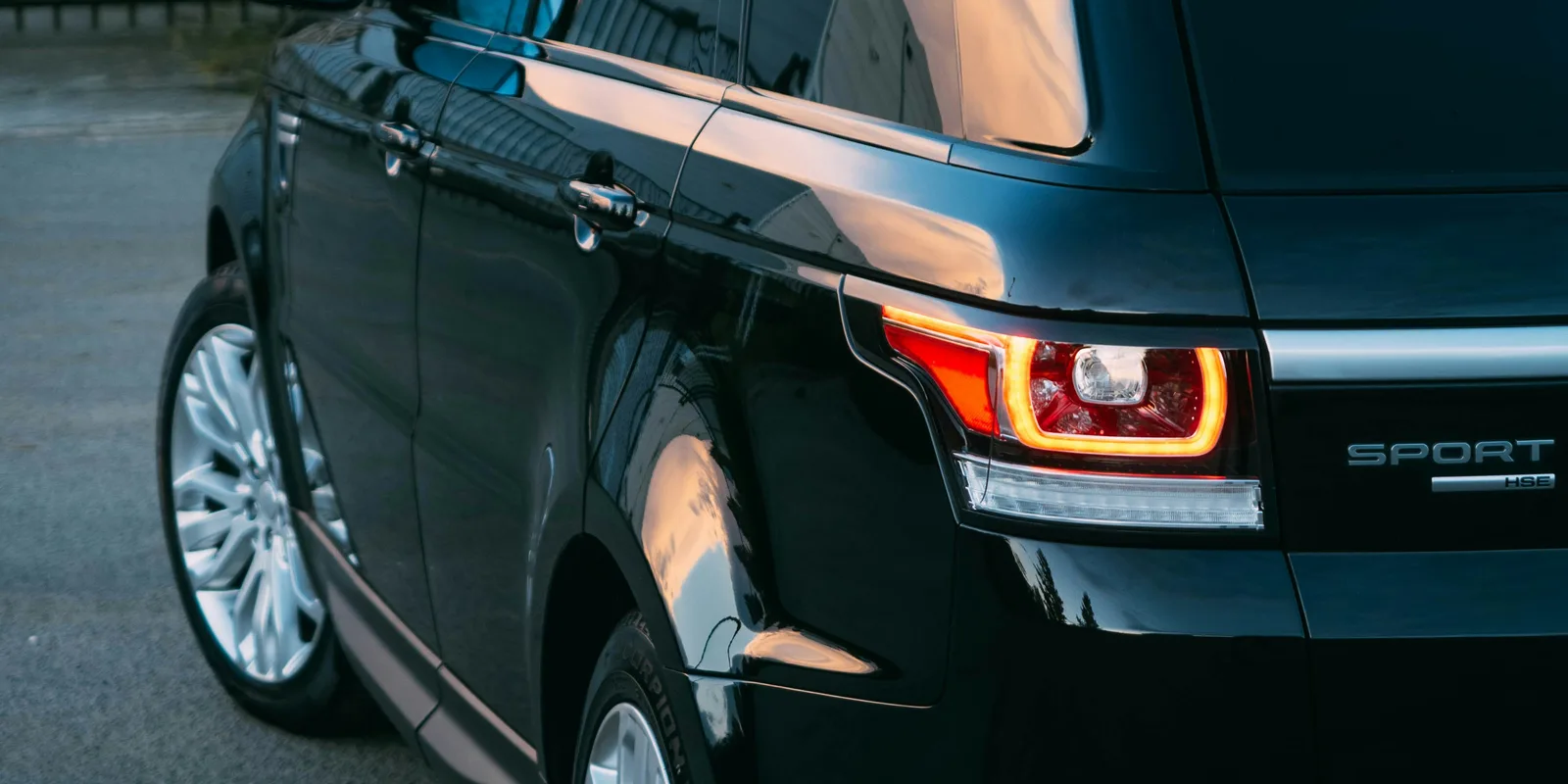 Range Rover taillight close-up, representing the Range Rover P530 SE available to rent in Boston